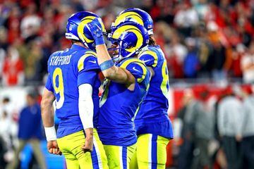 Jan 23, 2022; Tampa, Florida, USA; Los Angeles Rams quarterback Matthew Stafford (9) celebrates with wide receiver Cooper Kupp (10) after a play during the second half against the Tampa Bay Buccaneers in a NFC Divisional playoff football game at Raymond J