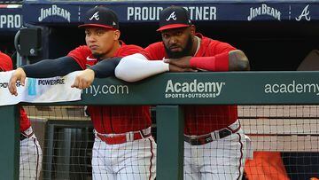 ATLANTA, GEORGIA - AUGUST 19: Marcell Ozuna #20 and William Contreras #24 of the Atlanta Braves look on from the dugout during the first inning against the Houston Astros at Truist Park on August 19, 2022 in Atlanta, Georgia.   Kevin C. Cox/Getty Images/AFP
== FOR NEWSPAPERS, INTERNET, TELCOS & TELEVISION USE ONLY ==