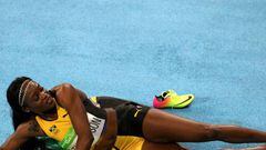 RIO DE JANEIRO, BRAZIL - AUGUST 17: Elaine Thompson of Jamaica reacts after winning the gold medal in the Women&#039;s 200m Final on Day 12 of the Rio 2016 Olympic Games at the Olympic Stadium on August 17, 2016 in Rio de Janeiro, Brazil. (Photo by Ian Wa
