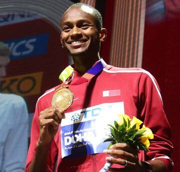 Gold medalist Mutaz Essa Barshim on the podium in Doha.
