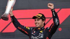Red Bull Racing's Mexican driver Sergio Perez celebrates with the trophy after winning the Formula One Azerbaijan Grand Prix at the Baku City Circuit in Baku on April 30, 2023. (Photo by Giuseppe CACACE / AFP)