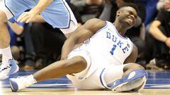 DURHAM, NORTH CAROLINA - FEBRUARY 20: Zion Williamson #1 of the Duke Blue Devils reacts after falling as his shoe breaks against Luke Maye #32 of the North Carolina Tar Heels during their game at Cameron Indoor Stadium on February 20, 2019 in Durham, Nort