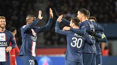 Paris Saint-Germain's Argentine forward Lionel Messi (C) celebrates with teammates after scoring his team's second goal during the French L1 football match between Paris Saint-Germain (PSG) and SCO Angers at The Parc des Princes Stadium in Paris on January 11, 2023. (Photo by Bertrand GUAY / AFP)