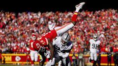 Dec 12, 2021; Kansas City, Missouri, USA; Kansas City Chiefs wide receiver Byron Pringle (13) is upended by Las Vegas Raiders safety Johnathan Abram (24) as cornerback Casey Hayward (29) defends during the first half at GEHA Field at Arrowhead Stadium. Ma