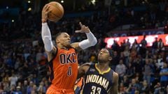 Nov 20, 2016; Oklahoma City, OK, USA; Oklahoma City Thunder guard Russell Westbrook (0) drives to the basket against Indiana Pacers center Myles Turner (33) during the fourth quarter at Chesapeake Energy Arena. Mandatory Credit: Mark D. Smith-USA TODAY Sports
