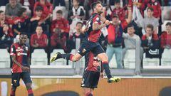 Genoa&#039;s Daniel Bessa (C) celebrates scoring against Juventus. 
