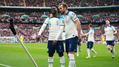 LONDON, ENGLAND - MARCH 26: Bukayo Saka of England celebrates with Harry Kane after scoring the team's second goal during the UEFA EURO 2024 qualifying round group C match between England and Ukraine at Wembley Stadium on March 26, 2023 in London, England. (Photo by Eddie Keogh - The FA/The FA via Getty Images)