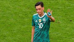 (FILES) In this file photo taken on June 27, 2018 Germany&#039;s midfielder Mesut Ozil reacts at the end of the Russia 2018 World Cup Group F football match between South Korea and Germany at the Kazan Arena in Kazan on June 27, 2018.