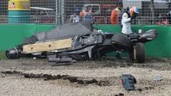 Fernando Alonso emerges from the wreck of his car in Australia. 