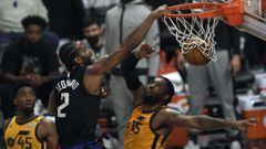 LOS ANGELES, CA - JUNE 14: Kawhi Leonard #2 of the Los Angeles Clippers slam dunks against Derrick Favors #15 of the Utah Jazz during the first half in Game Four of the Western Conference second-round playoff series at Staples Center on June 14, 2021 in L