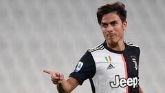 Juventus&#039; Argentine forward Paulo Dybala celebrates after opening the scoring during the Italian Serie A football match Juventus vs Lecce played on June 26, 2020 behind closed doors at the Juventus stadium in Turin, as the country eases its lockdown aimed at curbing the spread of the COVID-19 infection, caused by the novel coronavirus. (Photo by Miguel MEDINA / AFP)