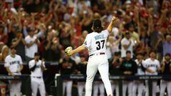 Oct 11, 2023; Phoenix, Arizona, USA; Arizona Diamondbacks relief pitcher Kevin Ginkel (37) reacts after an out against the Los Angeles Dodgers in the seventh inning for game three of the NLDS for the 2023 MLB playoffs at Chase Field. Mandatory Credit: Mark J. Rebilas-USA TODAY Sports