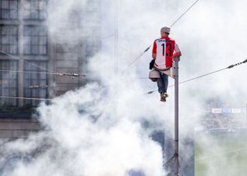 Feyenoord supporter with a bird's eye view of the celebrations in Rotterdam.