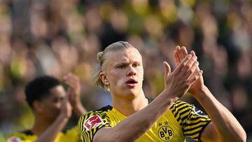 Dortmund's Erling Haaland applauds after 6-1 win over Wolfsburg. (Photo by INA FASSBENDER / AFP) / DFL)