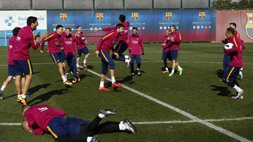 Barcelona&#039;s players share a joke during training. 