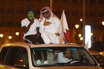 Qatari fans cheer after their national team won the final match against Japan during the 2019 AFC Asian Cup on February 1, 2019, in the Qatari capital Doha. 