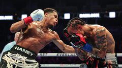 SAN FRANCISCO, CALIFORNIA - DECEMBER 09: Devin Haney punches Regis Prograis during their WBC World Super Lightweight Title fight at Chase Center on December 09, 2023 in San Francisco, California.   Ezra Shaw/Getty Images/AFP (Photo by EZRA SHAW / GETTY IMAGES NORTH AMERICA / Getty Images via AFP)