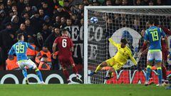 Liverpool&#039;s Brazilian goalkeeper Alisson Becker (2R) saves a shot from Napoli&#039;s Polish striker Arkadiusz Milik (L) during the UEFA Champions League group C 