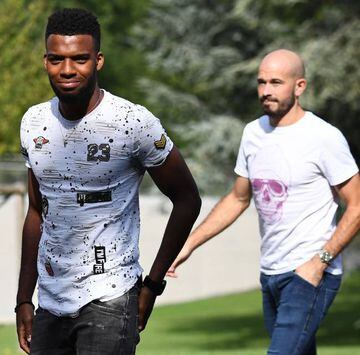 France's midfielder Thomas Lemar (L) and defender Christophe Jallet arrive at the French national football team training base in Clairefontaine.