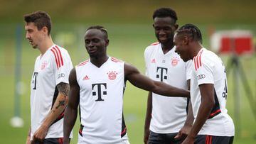 MUNICH, GERMANY - JULY 26: Sadio Mane shares a laugh with Mathys Tel of FC Bayern München during a training session of FC Bayern München at Saebener Strasse training ground on July 26, 2022 in Munich, Germany. (Photo by A. Pretty/Getty Images for FC Bayern)