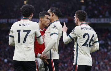 Bring it | Liverpool's Virgil van Dijk gets in between Andy Robertson and Manchester United's Cristiano Ronaldo.