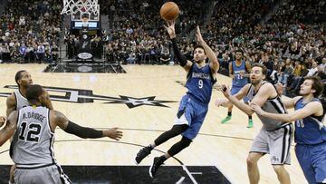 Mar 4, 2017; San Antonio, TX, USA; Minnesota Timberwolves point guard Ricky Rubio (9) shoots the ball against the San Antonio Spurs during overtime at AT&amp;T Center. The Spurs won 97-90 in overtime. Mandatory Credit: Soobum Im-USA TODAY Sports