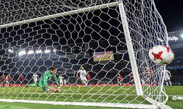 Real Madrid's Cristiano Ronaldo (C) scores a goal against against Kashima Antlers' goalkeeper Hitoshi Sogahata