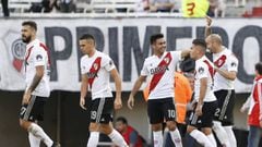 BUENOS AIRES, ARGENTINA - MAY 11: Javier Pinola of River Plate celebrates with teammates after scoring the first goal of his team during a match between River Plate and Estudiantes de La Plata as part of Superliga 2017/18 at Estadio Monumental Antonio Vespucio Liberti on May 10, 2018 in Buenos Aires, Argentina. (Photo by Gabriel Rossi/Getty Images)