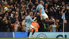 Manchester City&#039;s Belgian defender Vincent Kompany celebrates scoring the opening goal during the English Premier League football match between Manchester City and Leicester City at the Etihad Stadium in Manchester, north west England, on May 6, 2019