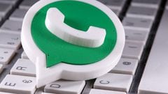 A 3D-printed Whatsapp logo is placed on the keyboard in this illustration.