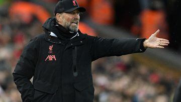 Liverpool's German manager Jurgen Klopp reacts during the English FA Cup third round football match between Liverpool and Wolverhampton Wanderers at Anfield in Liverpool, north-west England on January 7, 2023. (Photo by Oli SCARFF / AFP) / RESTRICTED TO EDITORIAL USE. No use with unauthorized audio, video, data, fixture lists, club/league logos or 'live' services. Online in-match use limited to 120 images. An additional 40 images may be used in extra time. No video emulation. Social media in-match use limited to 120 images. An additional 40 images may be used in extra time. No use in betting publications, games or single club/league/player publications. / 