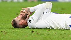 Paris Saint-Germain's Spanish defender Sergio Ramos lies on the pitch during the UEFA Champions League round of 16, 2nd-leg football match FC Bayern Munich v Paris Saint-Germain FC in Munich, southern Germany, on March 8, 2023. (Photo by CHRISTOF STACHE / AFP)
