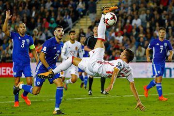 Spain's forward Iago Aspas goes airborne in his efforts for his country.