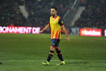 Xavi Hernández in action for Catalunya against Tunisia.