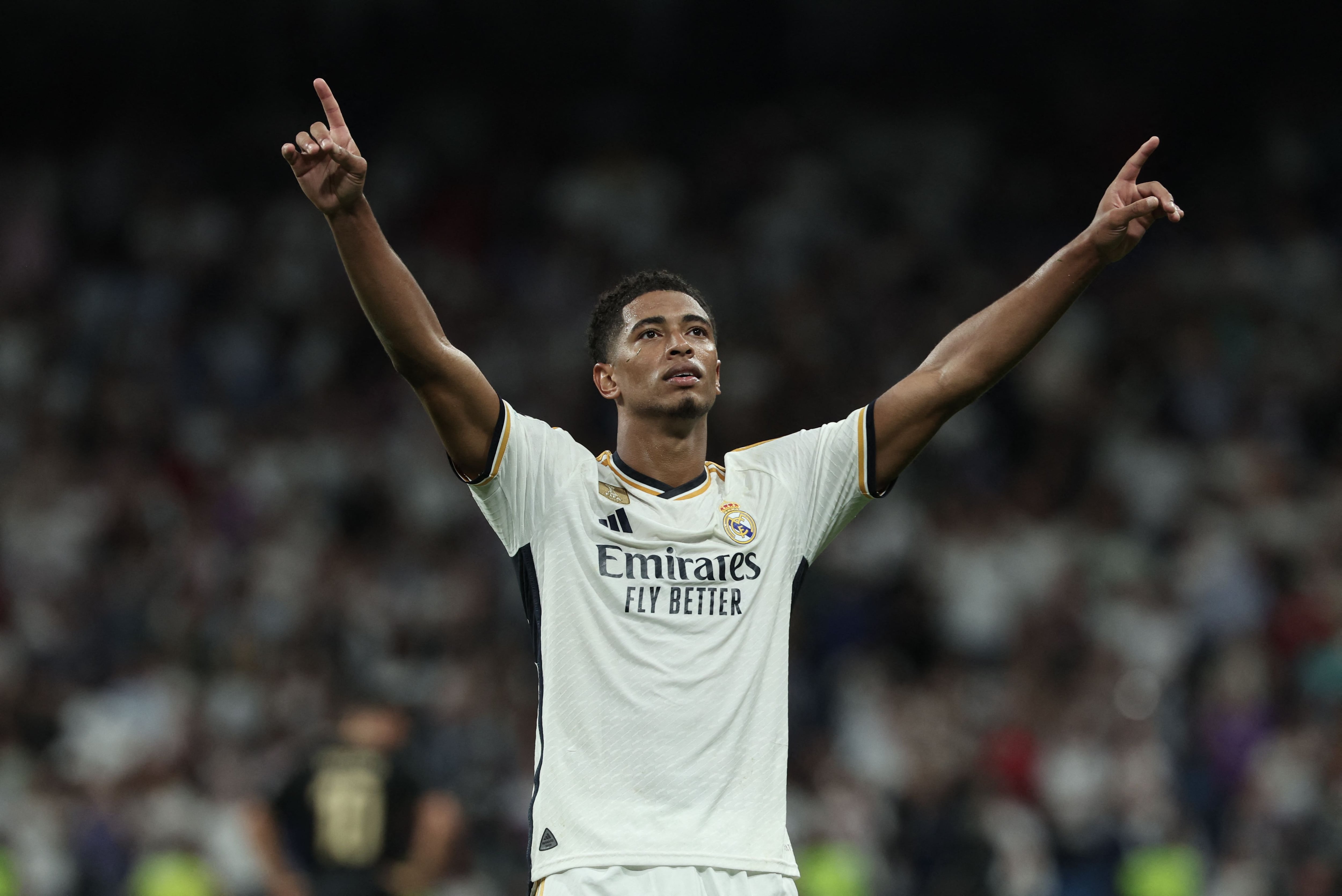 Real Madrid's English midfielder #5 Jude Bellingham celebrates scoring his team's first goal during the UEFA Champions League 1st round day 1 group C football match between Real Madrid and Union Berlin at the Santiago Bernabeu stadium in Madrid on September 20, 2023. (Photo by Thomas COEX / AFP)