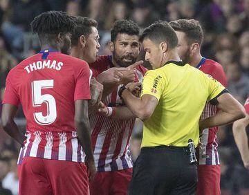 "Who, me?" Costa stating his case to Gil Manzano.
