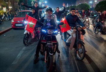 Locals celebrate in Marrakech after Morocco's victory over Ivory Coast in their FIFA 2018 World Cup Play-Off.