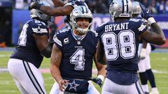 (EDITORS NOTE: caption correction) Dec 10, 2017; East Rutherford, NJ, USA; Dallas Cowboys quarterback Dak Prescott (4) and wide receiver Dez Bryant (88) celebrate a touchdown by running back Rod Smith (with ball) in the fourth quarter against the New York Giants during a NFL football game at MetLife Stadium. Mandatory Credit: Robert Deutsch-USA TODAY Sports
