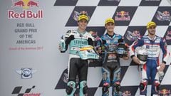 AUSTIN, TX - APRIL 22: (L-R) Joan Mir of Spain and Leopard Racing, Aron Canet of Spain and Estrella Galicia 0,0, and Romano Fenati of Italy and Marinelli Rivacold Snipers Team pose and celebrate at the end of the qualifying practice during the qualifying 