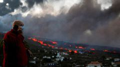 Zoilo Lorenzo, who was evacuated from the Martela neighbourhood six days ago, keeps an eye on the way the lava is flowing hoping it won&#039;t destroy his house as the Cumbre Vieja volcano continues to erupt on the Canary Island of La Palma, as seen from 