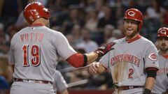 PHOENIX, AZ - JULY 08: Joey Votto #19 of the Cincinnati Reds is greeted at home by Zack Cozart #2 after hitting a two run homer against the Arizona Diamondbacks during the first inning of the MLB game at Chase Field on July 8, 2017 in Phoenix, Arizona.   