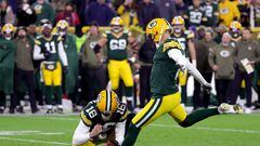 GREEN BAY, WISCONSIN - NOVEMBER 13: Mason Crosby #2 of the Green Bay Packers kicks a game winning field goal in overtime against the Dallas Cowboys at Lambeau Field on November 13, 2022 in Green Bay, Wisconsin.   Stacy Revere/Getty Images/AFP