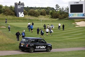 A LIV Golf branded electric car drives past the 16th during the Pro-Am at the Centurion Club, Hertfordshire
