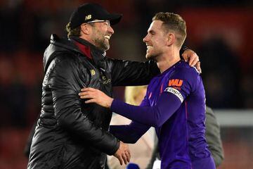 Liverpool manager Jurgen Klopp celebrates with Jordan Henderson after the win over Southampton.