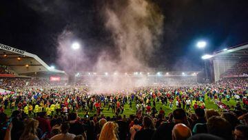 Nottingham Forest fans celebrate on the pitch after they reach the play off final during the Sky Bet Championship play-off semi-final, second leg match at the City Ground, Nottingham. Picture date: Tuesday May 17, 2022. (Photo by Zac Goodwin/PA Images via Getty Images)