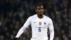 (FILES) In this file photograph taken on March 29, 2022, France's midfielder Paul Pogba controls the ball during a friendly football match between France and South Africa at The Pierre-Mauroy stadium in Villeneuve-d'Ascq, near Lille, northern France. - Paul Pogba's chances of playing in the upcoming World Cup are at risk again after media reports in Italy said he had suffered a thigh injury. France star Pogba had recently returned to training with Juventus, for whom he is yet to feature following a knee injury suffered in the summer (Photo by FRANCK FIFE / AFP)
