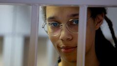 FILE PHOTO: U.S. basketball player Brittney Griner, who was detained at Moscow's Sheremetyevo airport and later charged with illegal possession of cannabis, stands inside a defendants' cage before a court hearing in Khimki outside Moscow, Russia August 4, 2022. REUTERS/Evgenia Novozhenina/Pool/File Photo