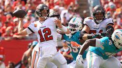 TAMPA, FLORIDA - OCTOBER 10: Tom Brady #12 of the Tampa Bay Buccaneers throws a pass during the third quarter against the Miami Dolphins at Raymond James Stadium on October 10, 2021 in Tampa, Florida.   Mike Ehrmann/Getty Images/AFP == FOR NEWSPAPERS, IN