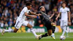 LEEDS, ENGLAND - OCTOBER 02: Douglas Luiz of Aston Villa is tackled by Tyler Adams of Leeds United during the Premier League match between Leeds United and Aston Villa at Elland Road on October 02, 2022 in Leeds, England. (Photo by Stu Forster/Getty Images)