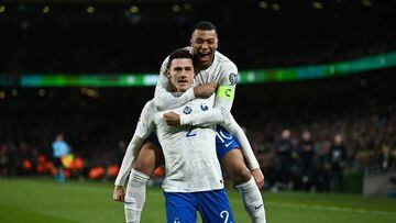 Dublin , Ireland - 27 March 2023; Benjamin Pavard of France, left, celebrates with team-mate Kylian Mbappé after scoring their side's first goal during the UEFA EURO 2024 Championship Qualifier match between Republic of Ireland and France at Aviva Stadium in Dublin. (Photo By Eóin Noonan/Sportsfile via Getty Images)